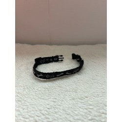 Collier noir avec dessins d'os argentés 2ème main